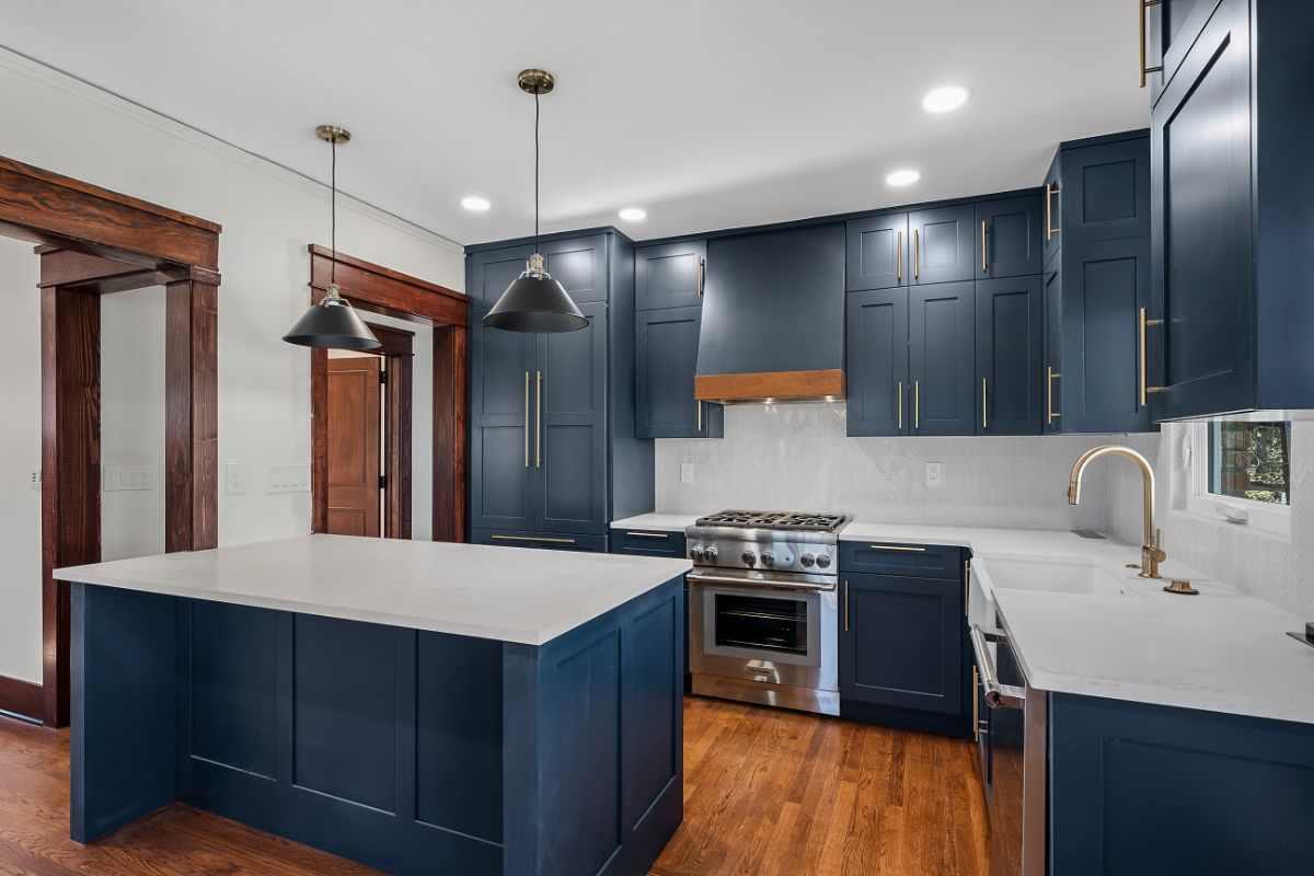 Longmont custom blue cabinets and white kitchen countertops